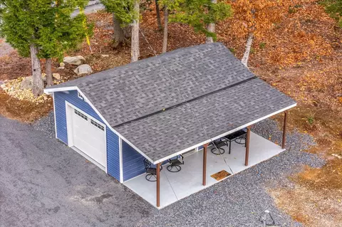 Exterior - 52 E Shore Rd, Embden, ME 04958 photo 5 of 13