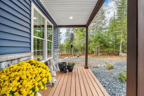 Exterior - 52 E Shore Rd, Embden, ME 04958 photo 6 of 13
