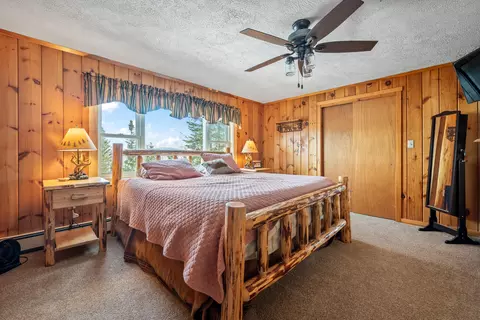 Bedroom - 303 Rumford Rd, Rangeley, ME 04970 photo 2 of 11