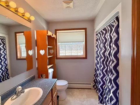 Bath - 17 Mountain Rd, Oxbow, ME 04764 photo 1 of 2