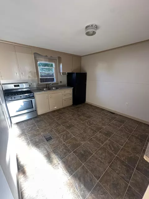 Kitchen - 99 State St, Millinocket, ME 04462 photo 3 of 3