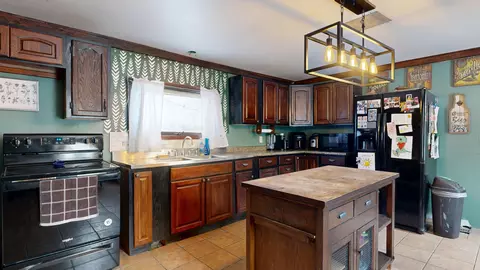 Kitchen - 3950 W River Rd, Sidney, ME 04330 photo 2 of 2