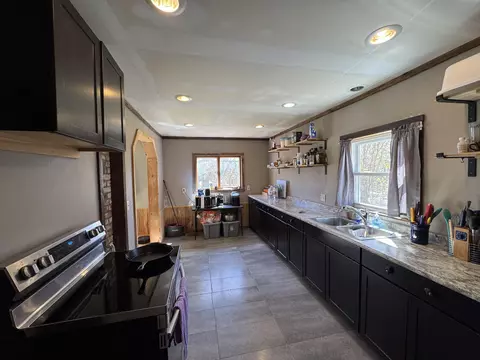 Kitchen - 61 Eastland Ave, Millinocket, ME 04462 photo 2 of 3