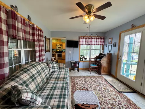 Living - 242 Bottle Lake Rd, Springfield, ME 04487 photo 3 of 3