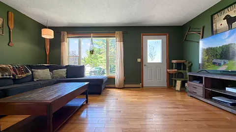 Living - 49 Hughes Rd, Mapleton, ME 04757 photo 2 of 6
