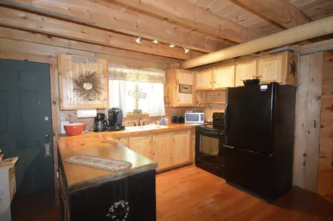 Kitchen - 91 Curtis Rd, Etna, ME 04434 photo 2 of 3
