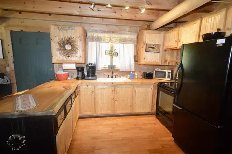 Kitchen - 91 Curtis Rd, Etna, ME 04434 photo 1 of 3