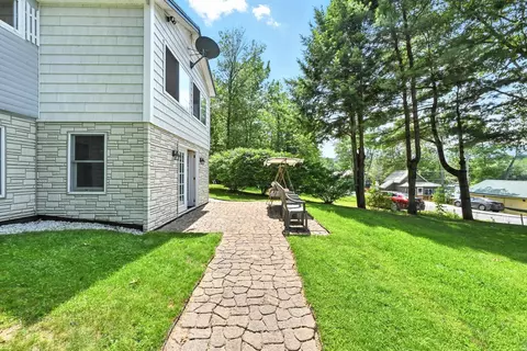 Exterior - 418 E Shore Rd, Peru, ME 04290 photo 7 of 15