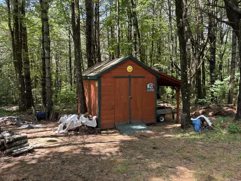 Exterior - 22 Old Farm Ln, Embden, ME 04958 photo 11 of 16