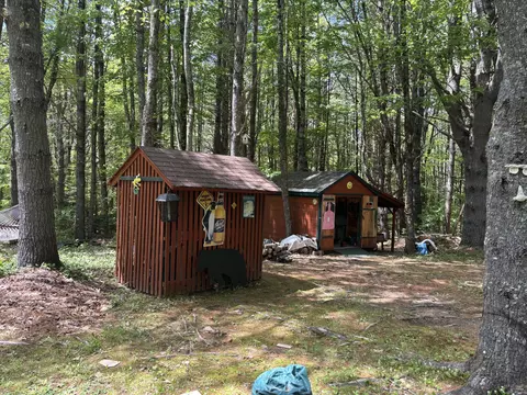 Exterior - 22 Old Farm Ln, Embden, ME 04958 photo 10 of 16