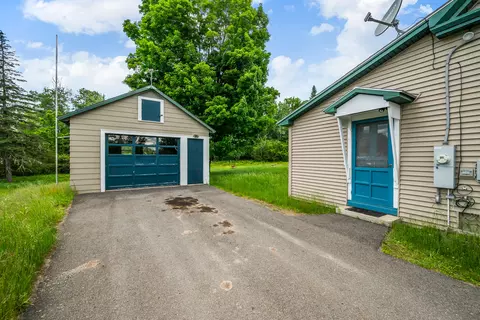 Exterior - 66 Allen St, Rangeley, ME 04970 photo 6 of 9
