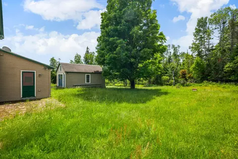 Exterior - 66 Allen St, Rangeley, ME 04970 photo 5 of 9