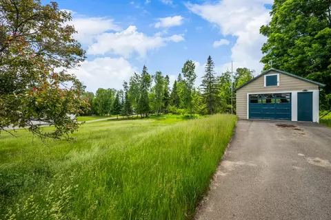 Exterior - 66 Allen St, Rangeley, ME 04970 photo 4 of 9