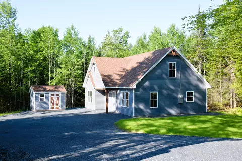 Exterior - 32 E Shore Rd, Embden, ME 04958 photo 2 of 10