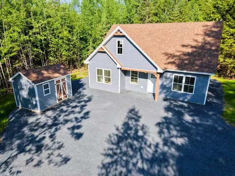 Exterior - 32 E Shore Rd, Embden, ME 04958 photo 3 of 10