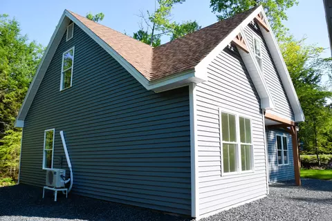 Exterior - 32 E Shore Rd, Embden, ME 04958 photo 6 of 10