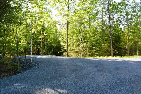 Exterior - 32 E Shore Rd, Embden, ME 04958 photo 8 of 10