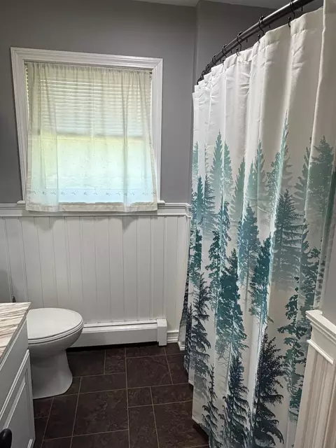 Bath - 110 Hanson Lake Rd, Mapleton, ME 04757 photo 1 of 2