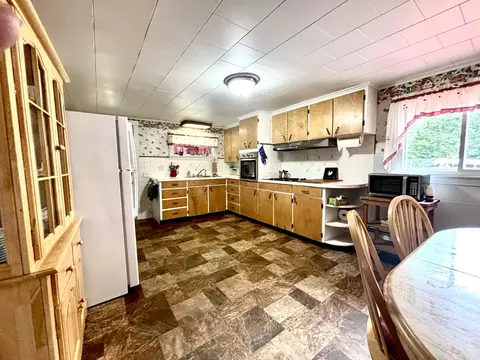 Kitchen - 244 Bates St, Millinocket, ME 04462 photo 2 of 3