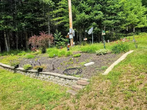 Exterior - 27 Brookside Ln, Lagrange, ME 04453 photo 5 of 8