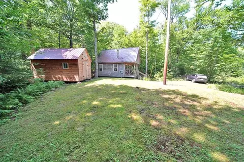 Exterior - 35 Sandy Beach Rd, Danforth, ME 04424 photo 8 of 16