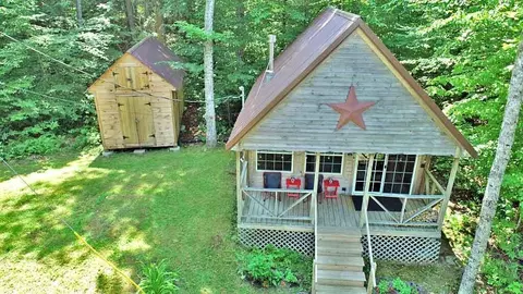 Exterior - 35 Sandy Beach Rd, Danforth, ME 04424 photo 5 of 16