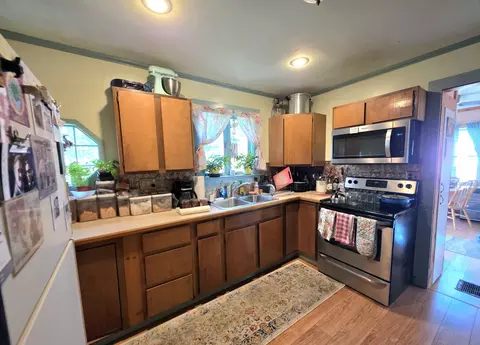 Kitchen - 38 Access Hwy, Limestone, ME 04750 photo 2 of 2