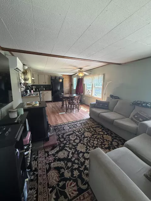 Living - 80 High Meadow Rd, Perham, ME 04766 photo 1 of 2