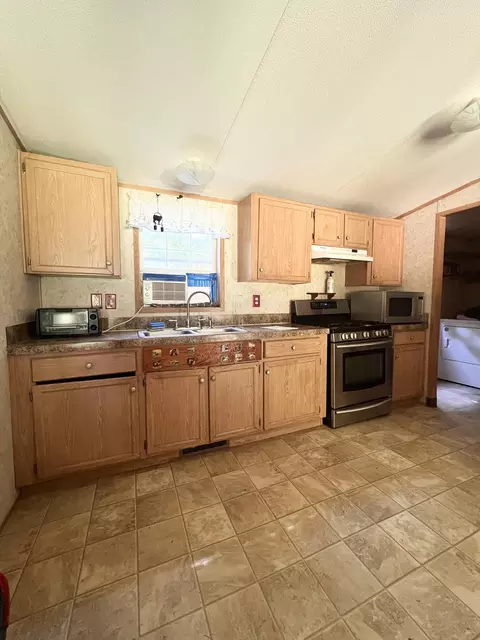 Kitchen - 369 Nelson Rd, Chelsea, ME 04330 photo 2 of 2