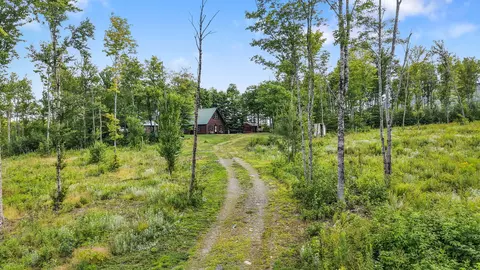 Exterior - 130 Schoolbus Rd, Mount Chase, ME 04765 photo 3 of 12