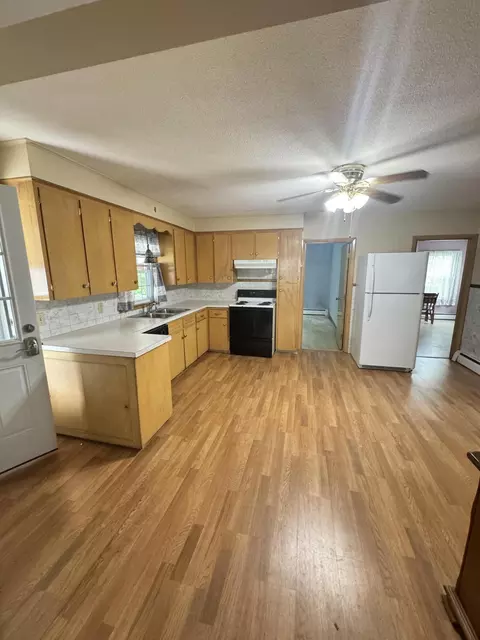 Kitchen - 48 Sylvan Ave, Lewiston, ME 04240 photo 2 of 3