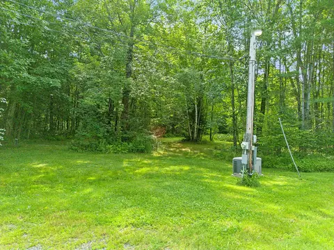 Exterior - 431 Juniper Ln S, Sidney, ME 04330 photo 10 of 11