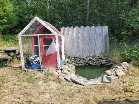 Exterior - 406 Shadow Ln, Etna, ME 04434 photo 9 of 12