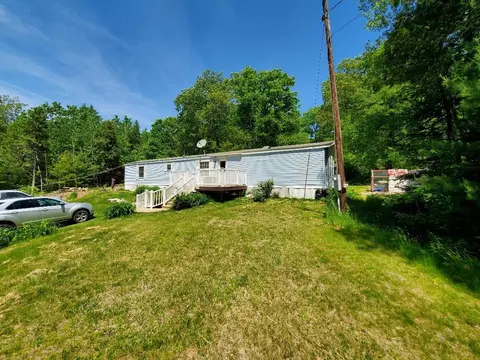 Exterior - 406 Shadow Ln, Etna, ME 04434 photo 4 of 12