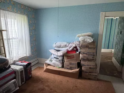 Bedroom - 246 Main St, Limestone, ME 04750 photo 2 of 7