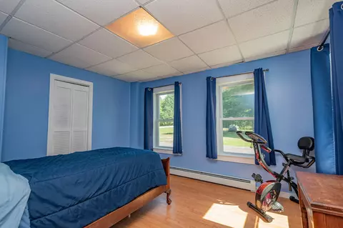 Bedroom - 427 E Dover Rd, Dover Foxcroft, ME 04426 photo 1 of 12