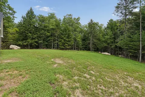 Exterior - 81 Mcgrath Pond Loop Rd, Belgrade, ME 04917 photo 5 of 10