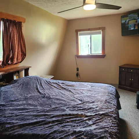 Bedroom - 70 Back Rd, Abbot, ME 04406 photo 2 of 3