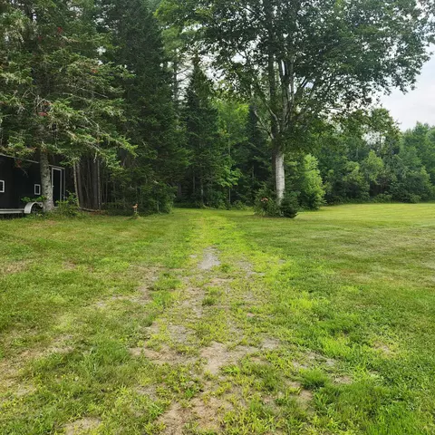 Exterior - 70 Back Rd, Abbot, ME 04406 photo 6 of 14