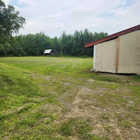 Exterior - 70 Back Rd, Abbot, ME 04406 photo 5 of 14