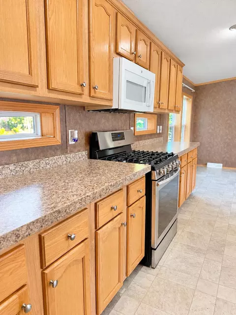 Kitchen - 397 Milo Rd, Sebec, ME 04481 photo 3 of 11
