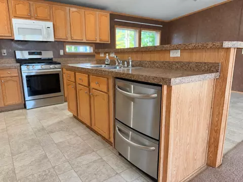 Kitchen - 397 Milo Rd, Sebec, ME 04481 photo 5 of 11
