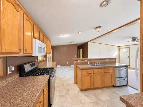 Kitchen - 397 Milo Rd, Sebec, ME 04481 photo 1 of 11