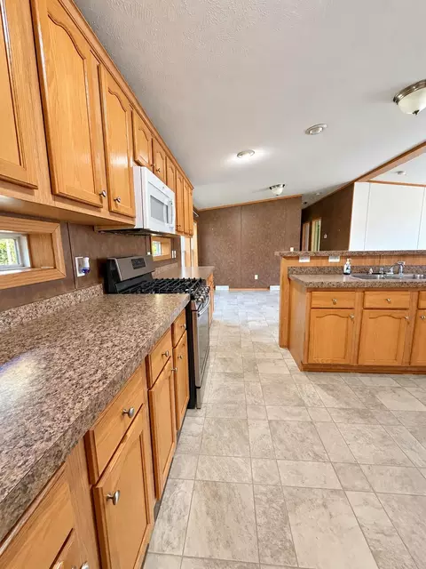 Kitchen - 397 Milo Rd, Sebec, ME 04481 photo 2 of 11