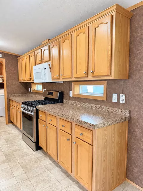 Kitchen - 397 Milo Rd, Sebec, ME 04481 photo 4 of 11
