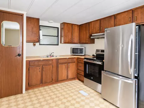 Kitchen - 216 Cedar St, Millinocket, ME 04462 photo 1 of 2