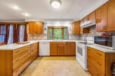 Kitchen - 77 Mcclellan Dr, Glenburn, ME 04401 photo 3 of 4