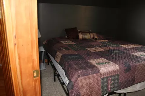 Bedroom - 16 Pleasant St, Patten, ME 04765 photo 2 of 3