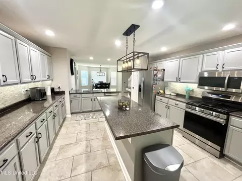 Kitchen - 492 Memphis Ave, Mount Pleasant, MS 38635 photo 2 of 3