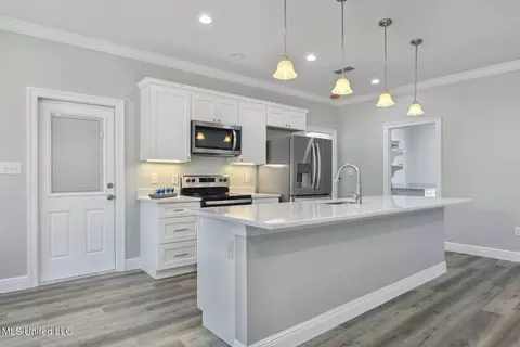Kitchen - 7341 Ahi Dr, Diamondhead, MS 39525 photo 2 of 2